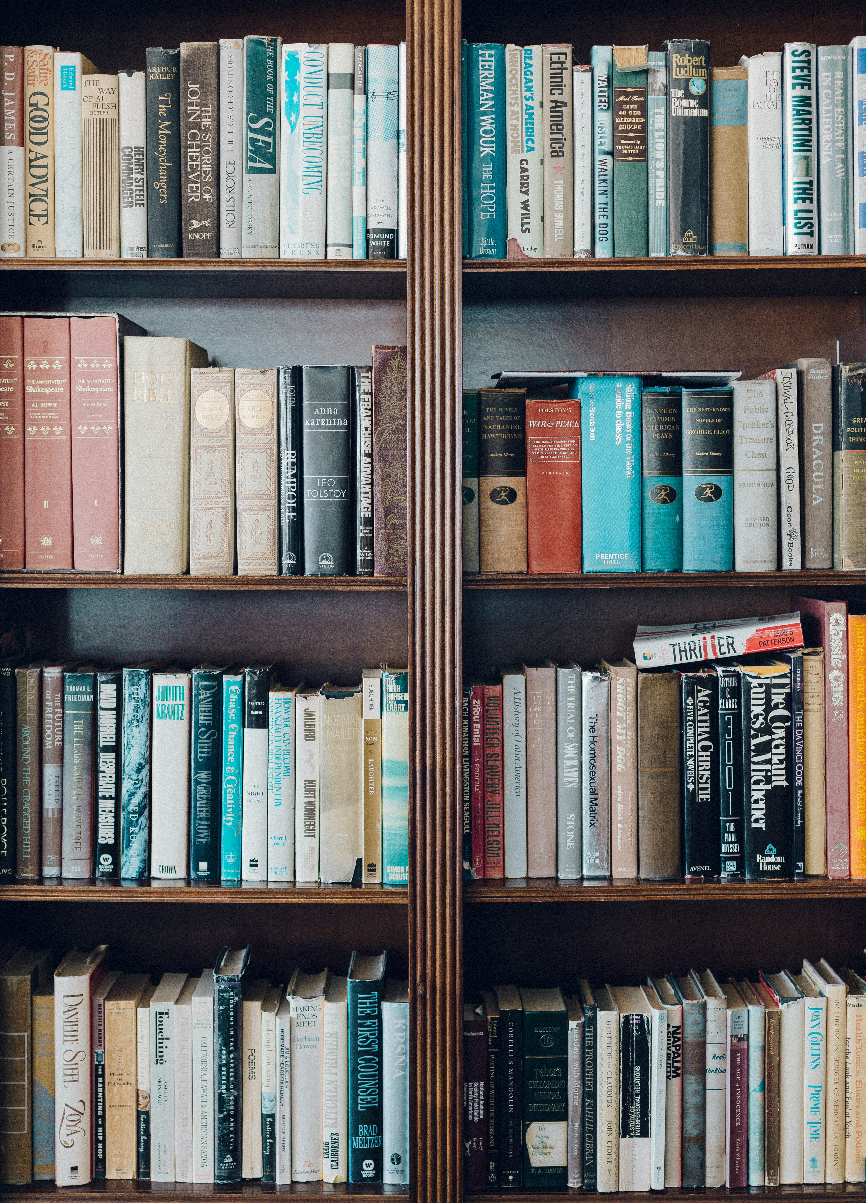 assorted-title book in bookcase